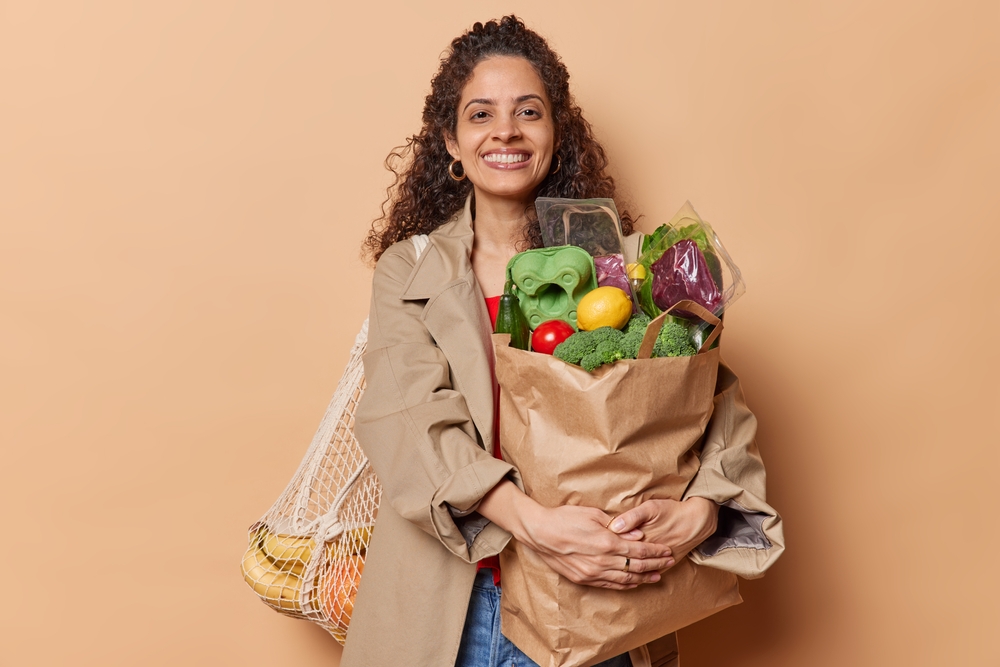 Woman has some healthy products in a bag